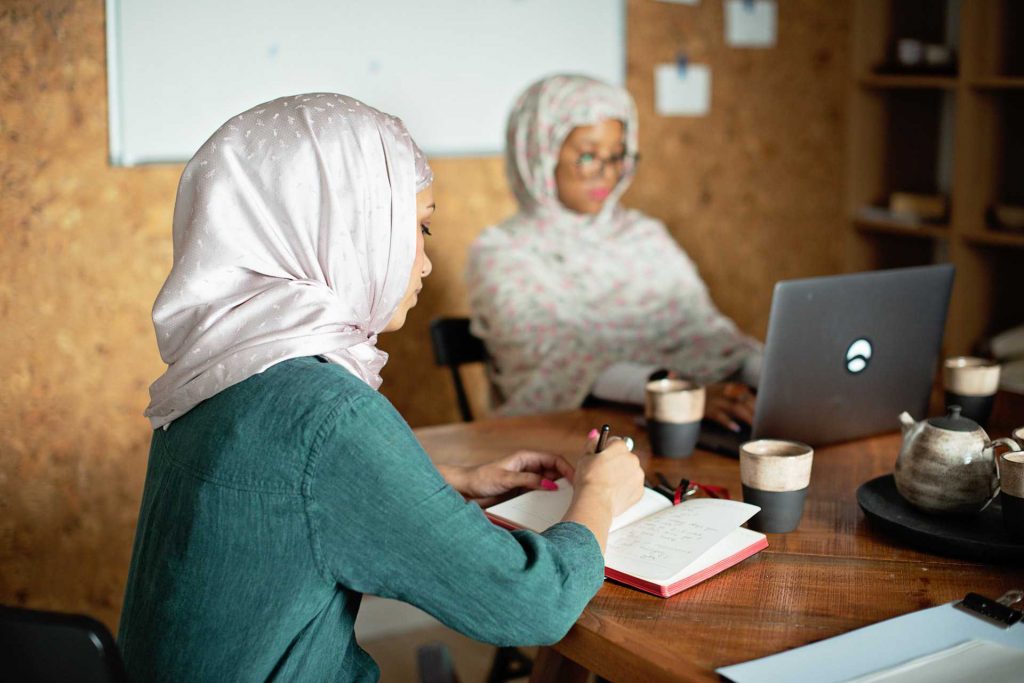 Negative feedback culture. A photo of two Arabic businesswomen