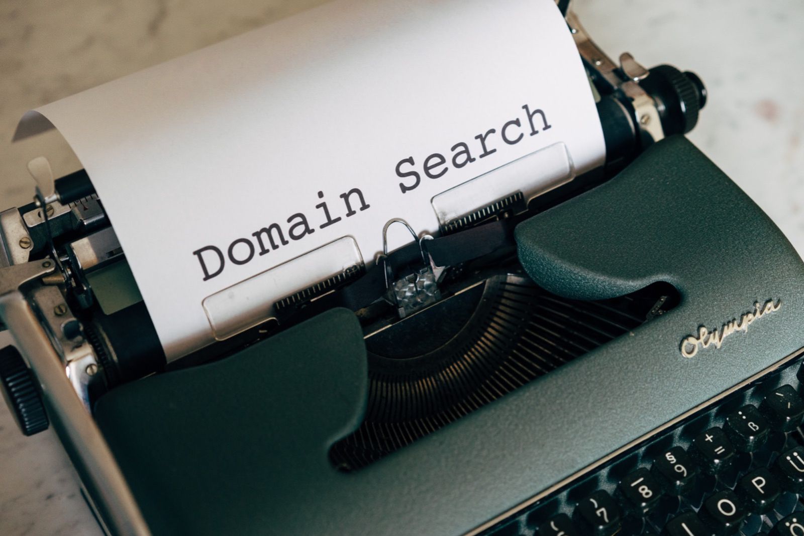 SEO domain. Words "domain in search" printing.